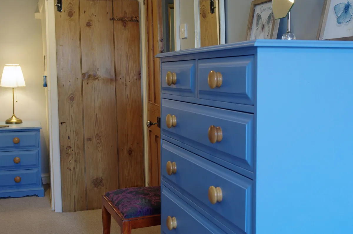 Single bedroom — blue painted furniture